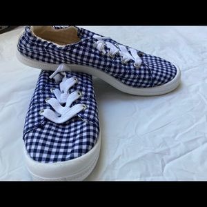 Roxy surf shoes. Size 6.5. Very clean. Like new. Navy blue and white